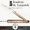 Fonderie de Laguiole TAUREAU: Couteau Legende 1012 - manche Pointe de Corne Blonde - lame acier inox 12C27 - ressort guilloch� main - Mouche motif TAUREAU FORGÉE taill�e et cisel�e main 