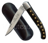 Country Basque knife: Sumptuous basque YATAGAN - 12C27 stainless steel blade with waves  1 brushed stainless steel bolster - Ebony wood handle decorated with 10 brass rosettes on each faces  hand engraved spring - delivered with black sheath